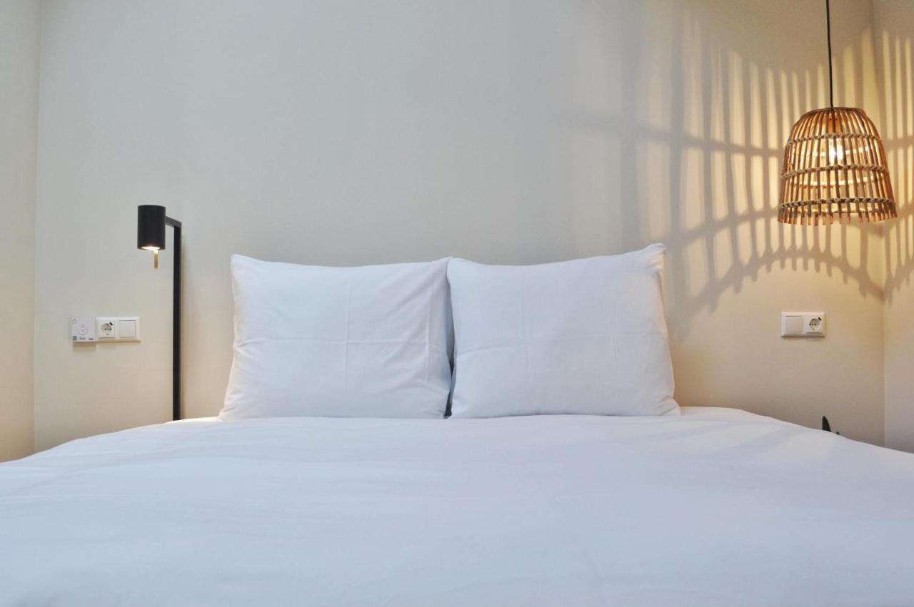 Van Heeckeren Apartments & Suites Buren 比伦 外观 照片